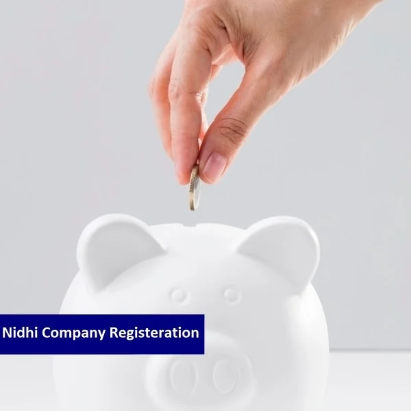 An image with a white background shows the white piggy bank and a hand putting the coin into the piggy bank, and the text "Nidhi Company Registration" appears with a dark blue background.