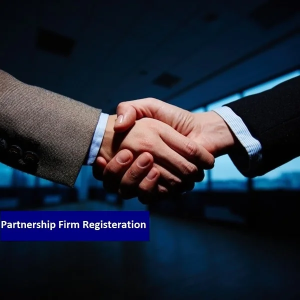 The image shows only the hands of two shaking hands, and the text "Partnership Firm Registration " appears with a dark blue background.
